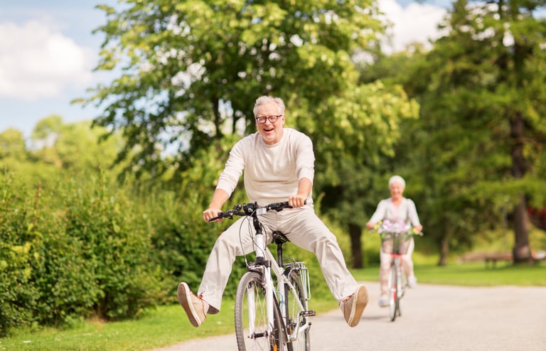 Senior man riding bicycle