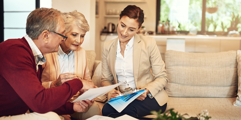 Senior couple getting advice from their financial consultant